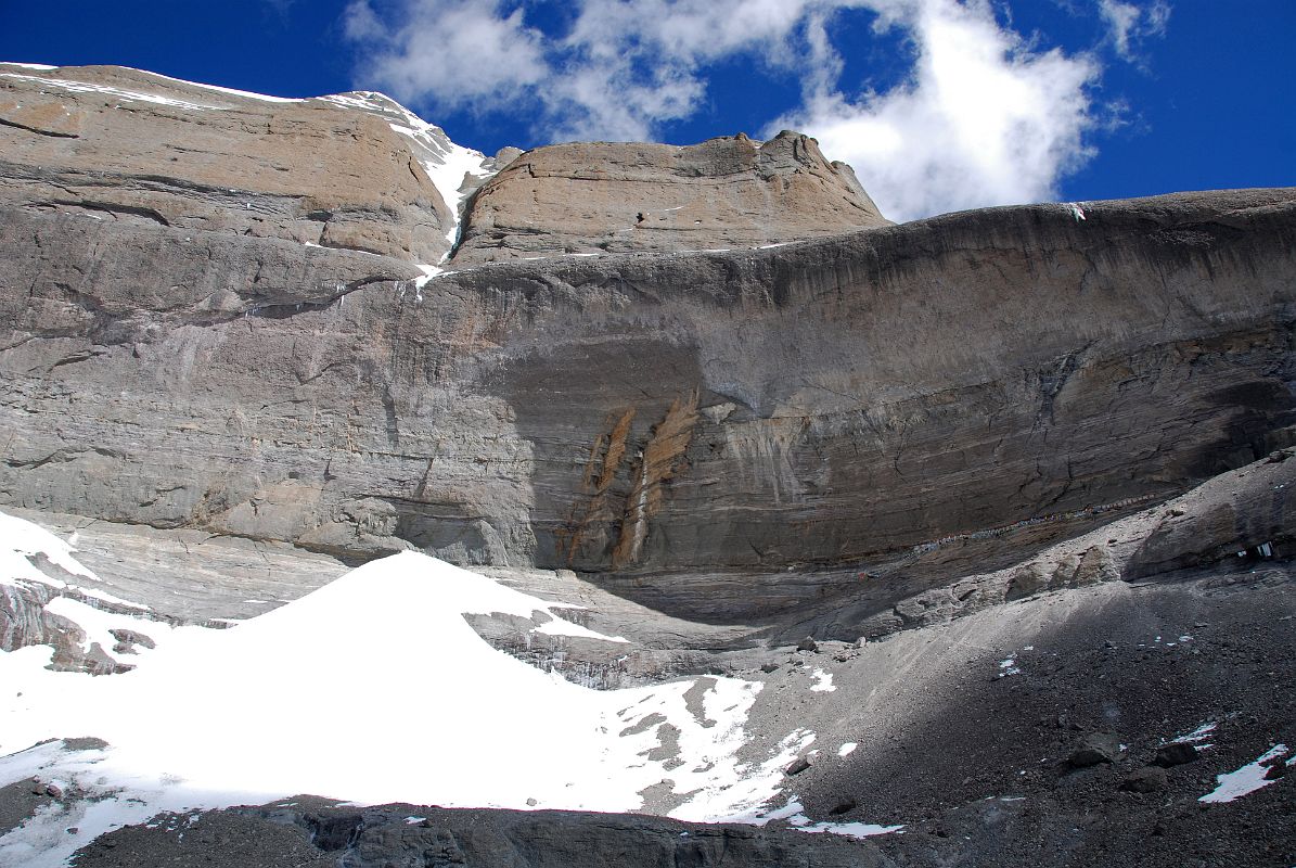 20 Looking Straight Up At Mount Kailash South Face, Atma Linga, And 13 Golden Chortens On Mount Kailash Inner Kora Nandi Parikrama The Mount Kailash South Face towers overhead as we near the face. The Atma Linga takes shape at the bottom of the face, and the 13 Golden Chortens are visible on the lower part of the face on the right (10:42)